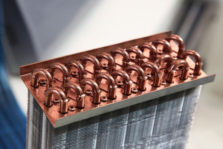 How Do I Know I Have a Cracked Heat Exchanger? Image shows copper color heat exchanger.